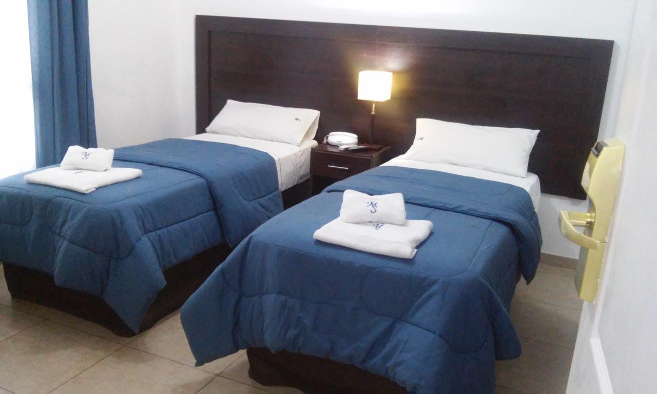 Morada Suites Campana Bagian luar foto