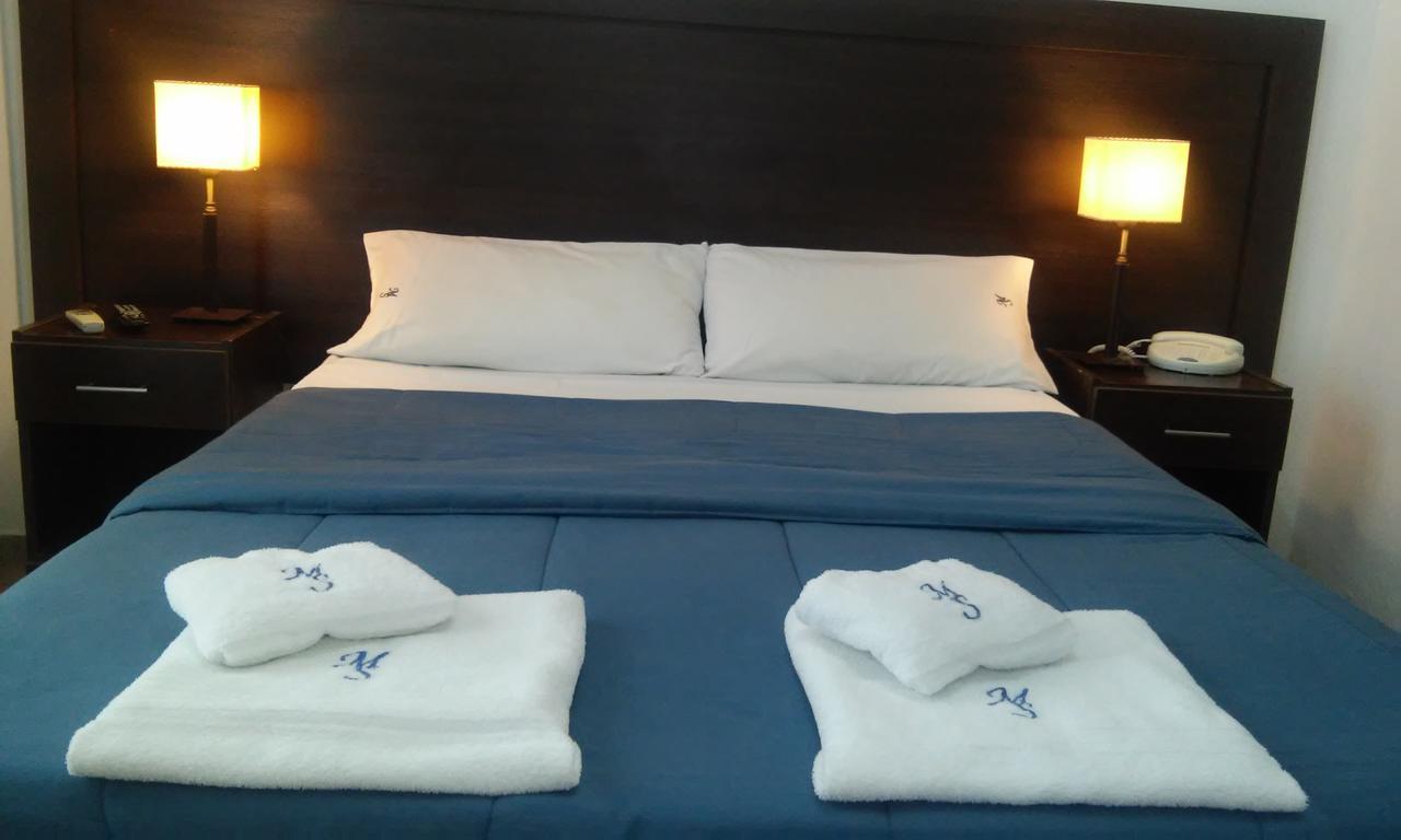 Morada Suites Campana Bagian luar foto